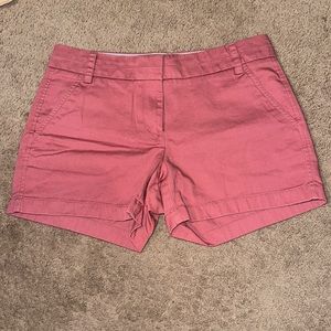 Dusty rose size 4 J. Crew chino short with 4 inch inseam.